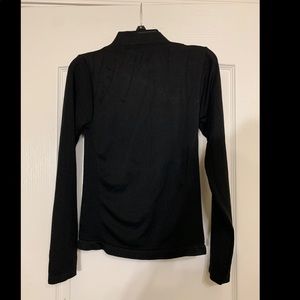 Turtleneck long sleeve tight fit.